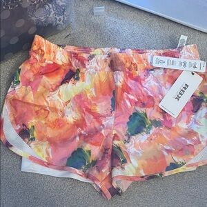 RBX Women's Coral Pink Orange Abstract Athletic Shorts